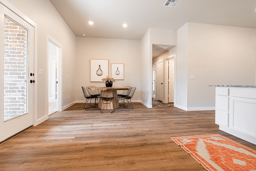 Dining area in the Giselle, one of Betenbough's homes with kitchen peninsula.