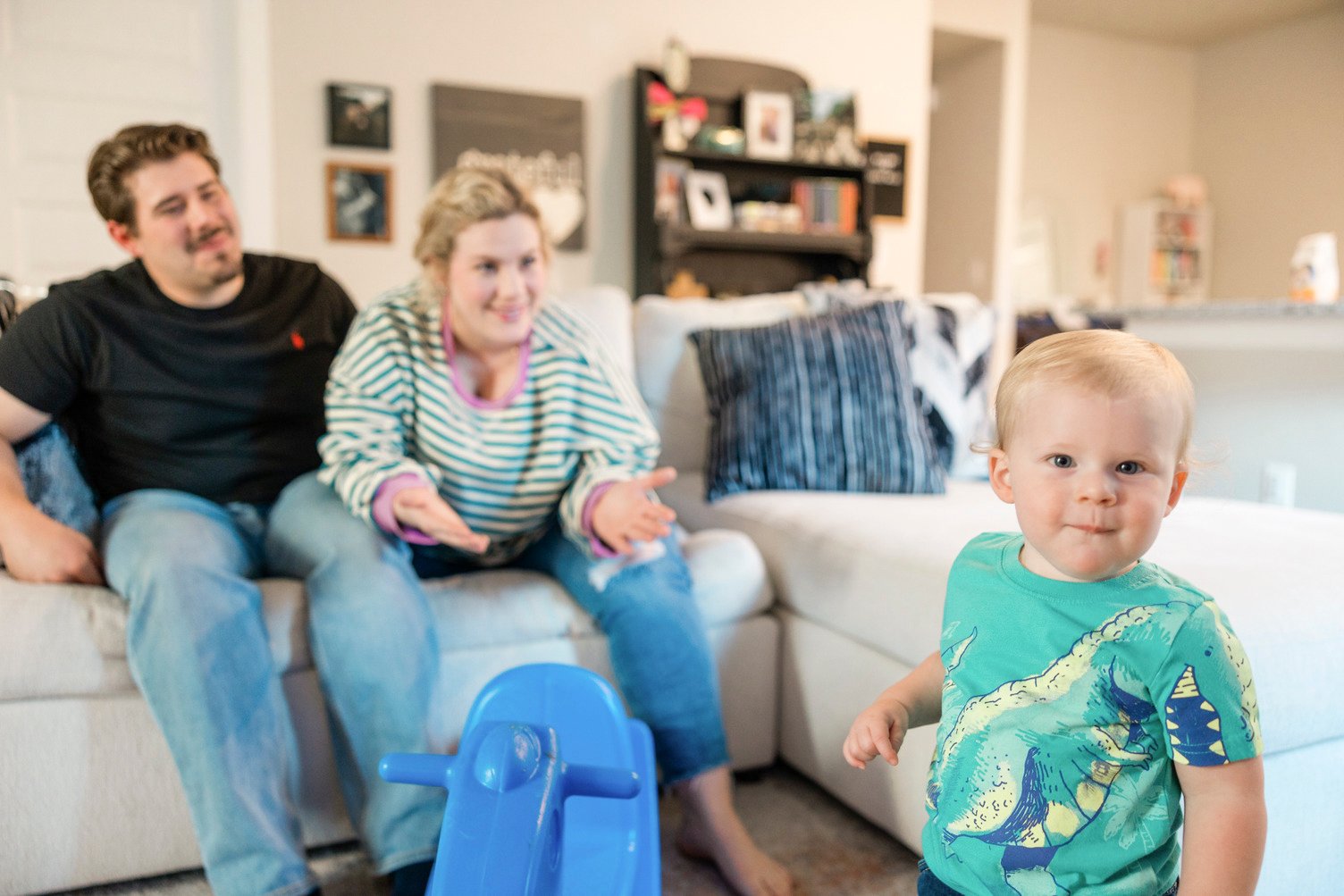 Family playing with their baby in their Betenbough home