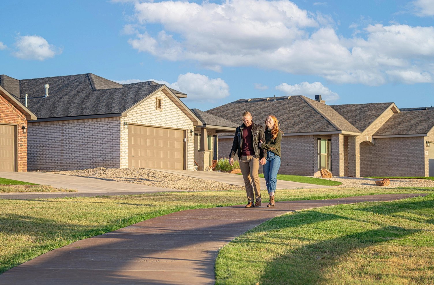 Couple holding hands walking