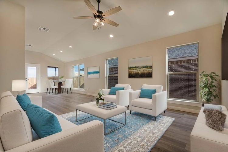 Bright staged family room of a Betenbough home