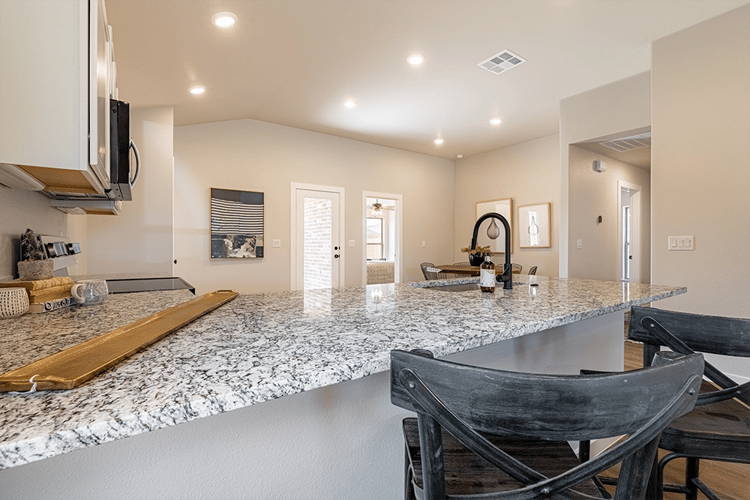Bar seating in the Giselle, one of Betenbough's homes with kitchen peninsula.