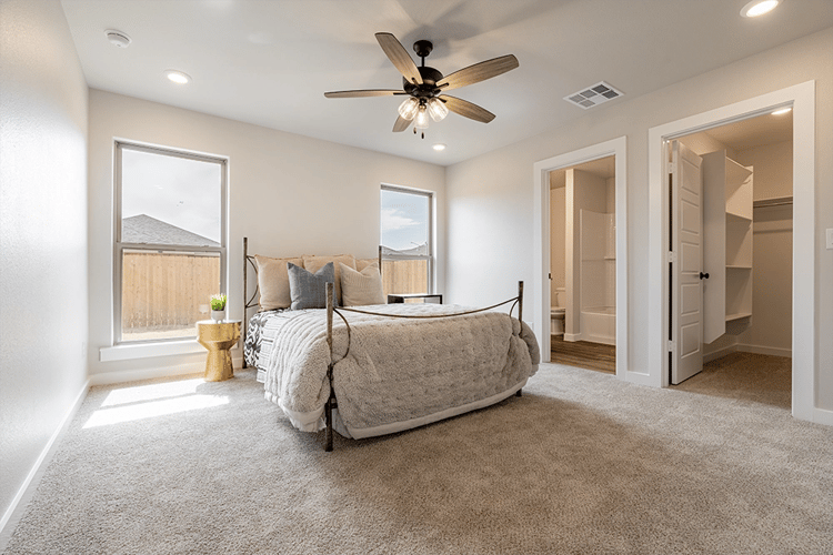 Master bedroom in the Giselle, a Betenbough Homes floor plan.