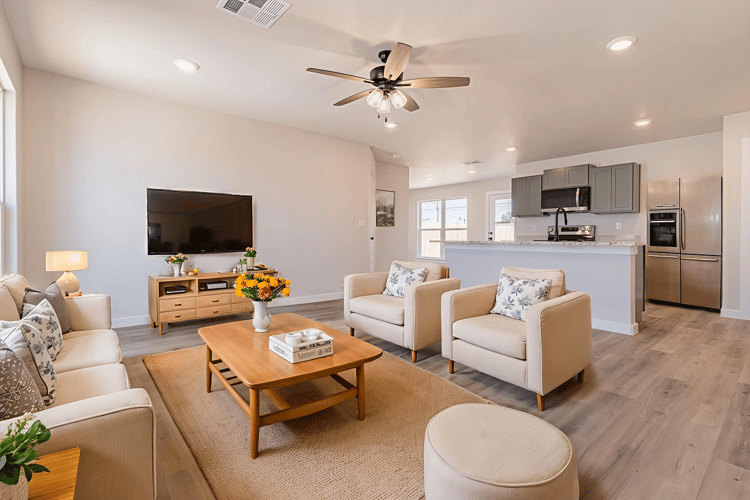 Furnished living room in the Florence, one of Betenbough Homes' affordable houses for sale.