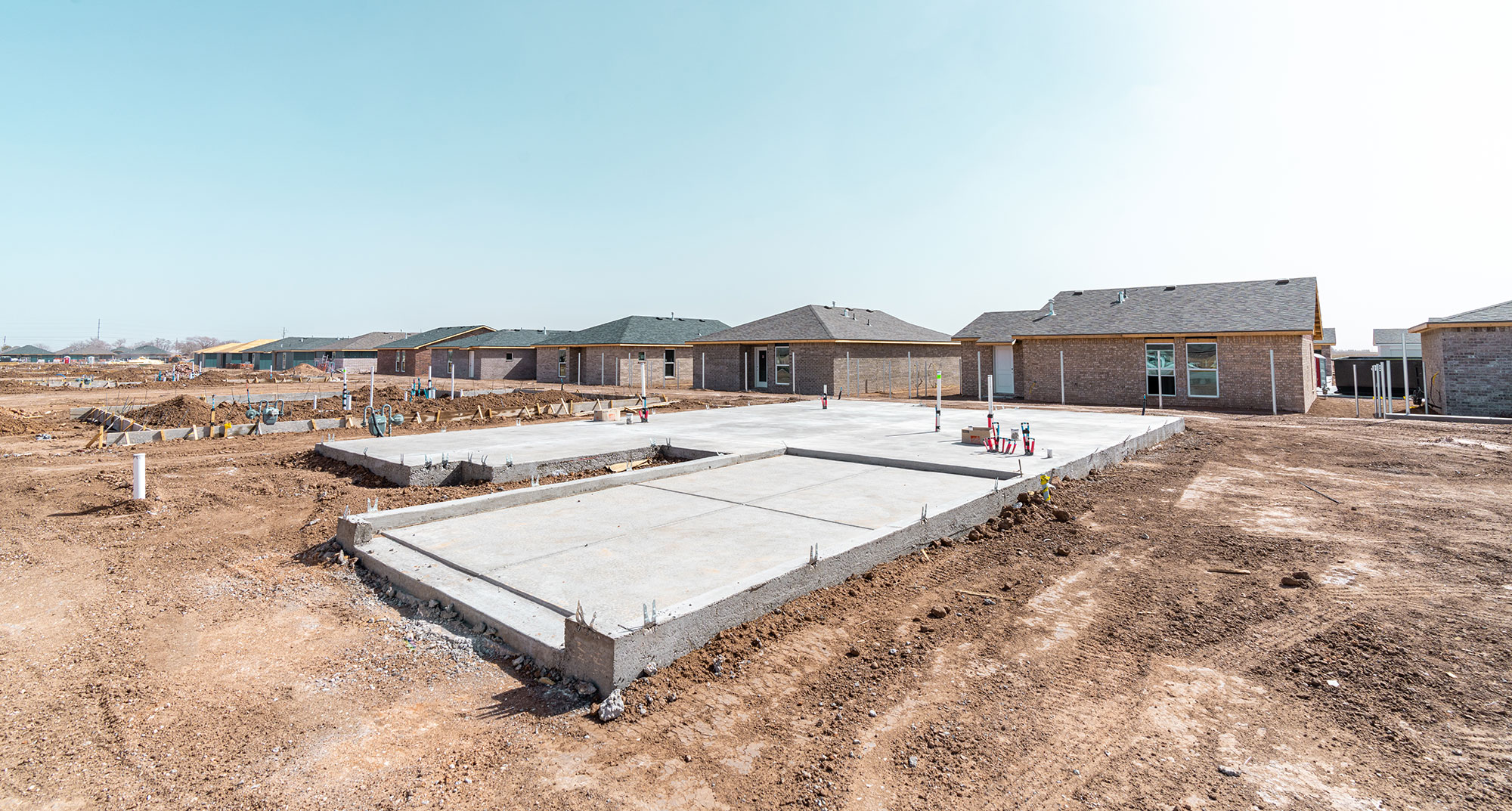 Photo of a poured slab in a Betenbough Homes community.