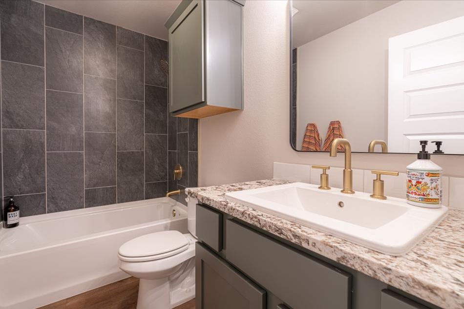 Photo of staged second bathroom in Betenbough Homes' 2025 Amarillo parade home.