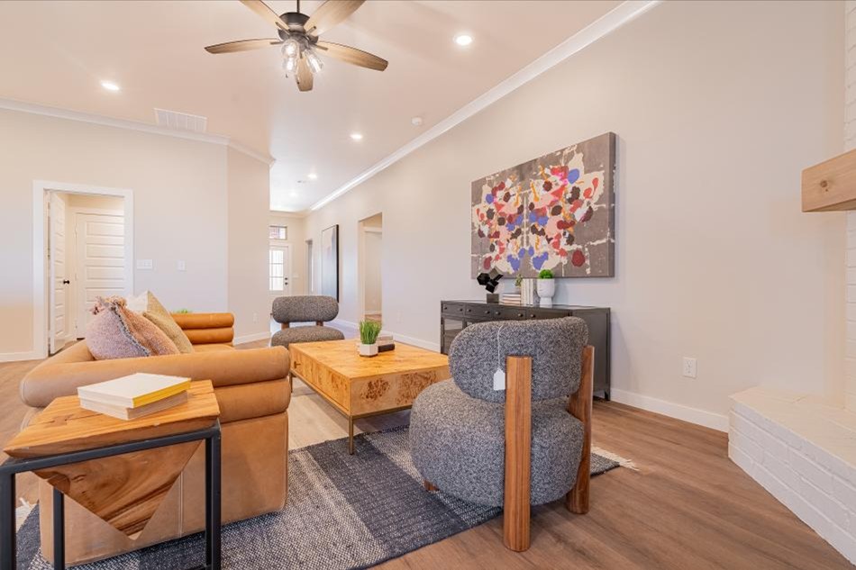 Photo of staged living room looking into entry way in Betenbough Homes' 2025 Amarillo parade home.
