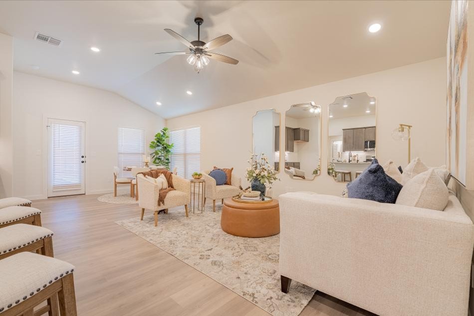 Photo of the staged living area in one of Betenbough Homes Midland's 2025 Parade Homes, the Mia.