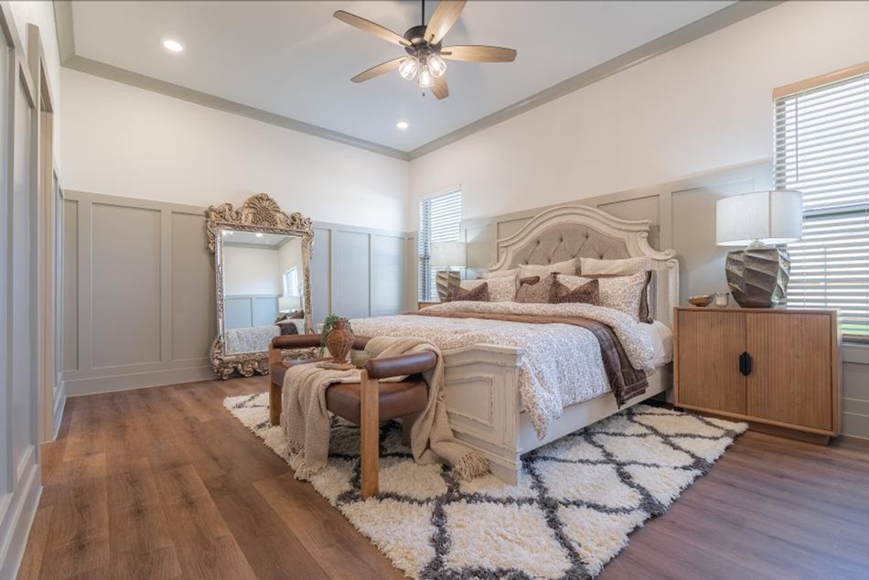 Photo of the staged master bedroom in one of Betenbough Homes Midland's 2025 Parade of Homes entries - the Vanessa floor plan.