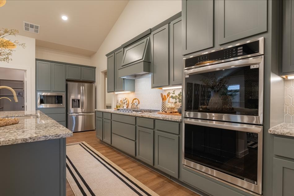 Photo the kitchen in the Midland Betenbough Homes' entry to the 2025 Parade of Homes - the Vanessa floor plan.