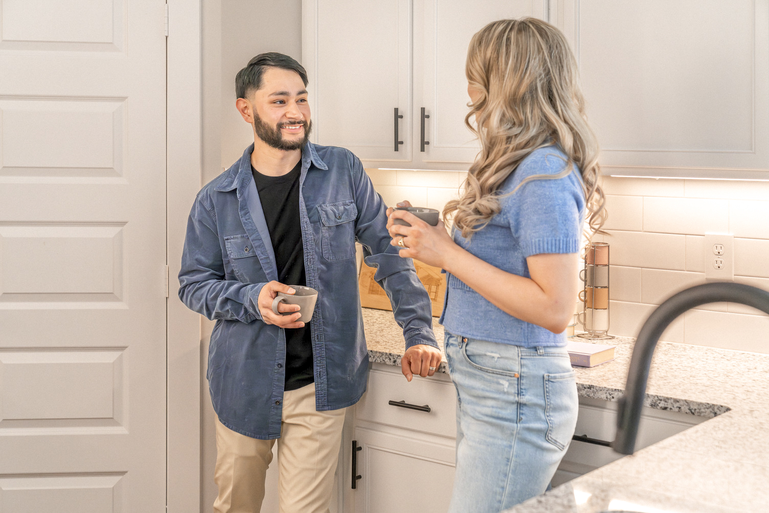 Modern kitchen inside of a new Betenbough home